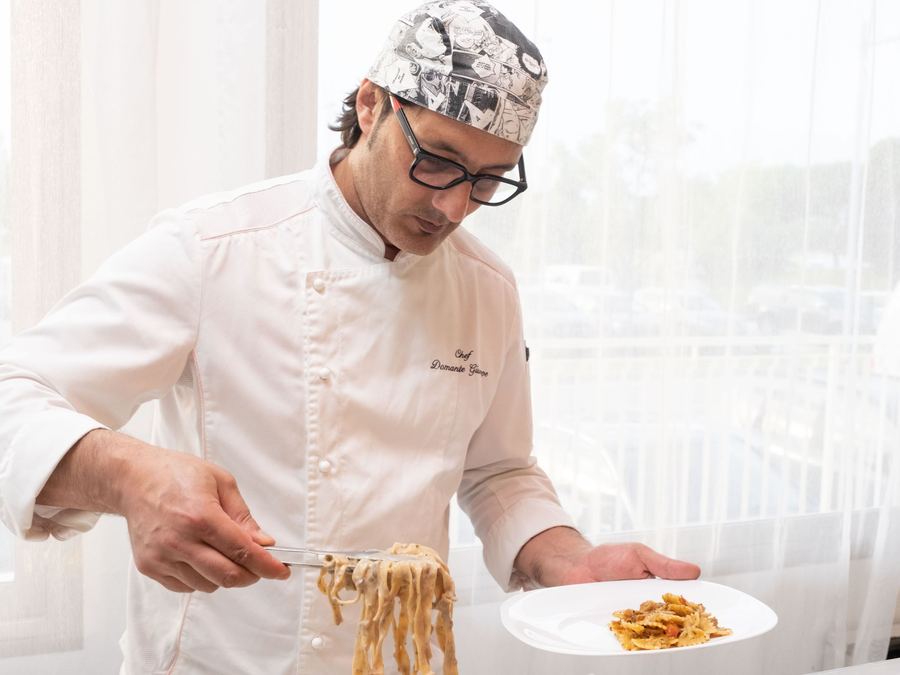 Chef plating a dish
